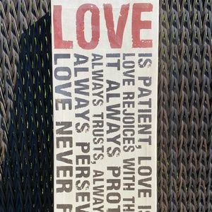 “Love Is…” canvas wall art. Used